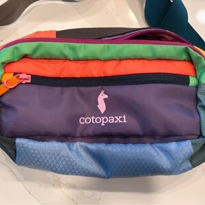 cotopaxi Colorblock Waist Pack in Purple, Blue, Green, Orange